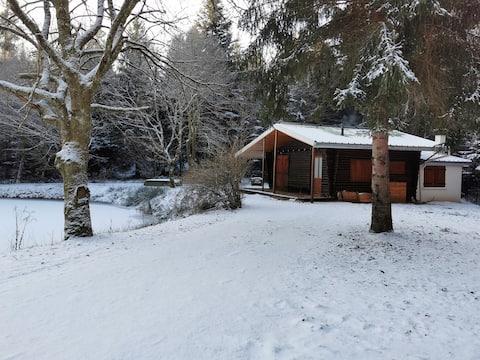 Chalet on the edge of a pond near Vosges.