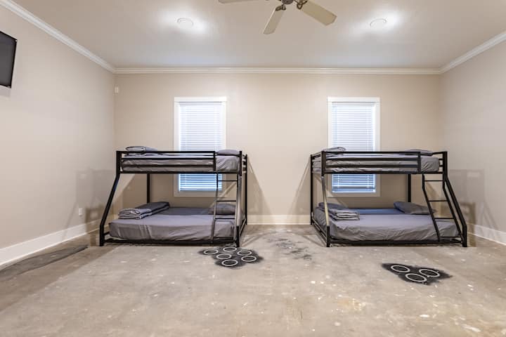 2 Twin over Full Bunkbeds occupy the converted garage space in the main house.