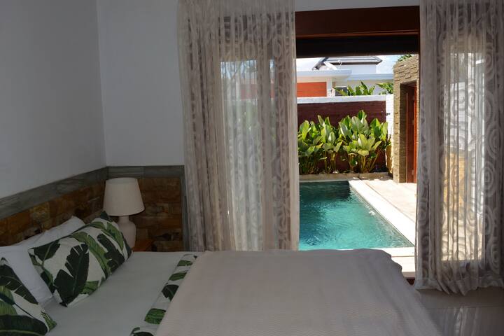 Bedroom with pool view