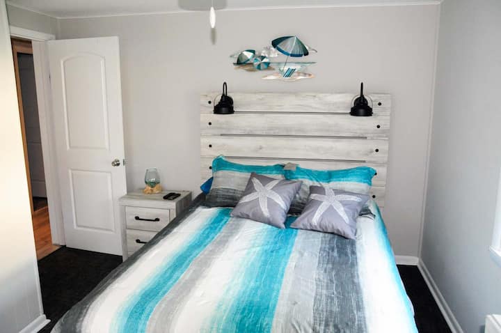 Bedroom 1 features a queen size adjustable bed (September 2024 furnishings)