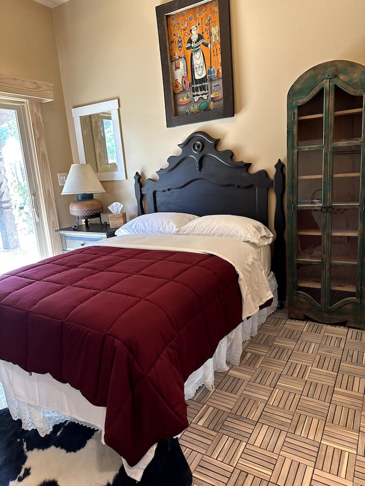 Lower Suite with Swim Spa, Tanning Salon and poker table. Great family Suite with adjoining rooms for parent and kids. Outside porch next to Barrel sauna.  for six and exit to Hot Tub.