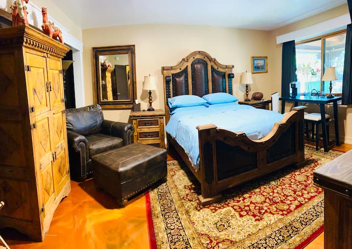 Queen sized Suite with custom Santa Fe style furnishings, kitchenette, 75" TV with private patio. Great for your morning coffee ! Access to Hot Tub and Sauna. Smallest but owner favorite.