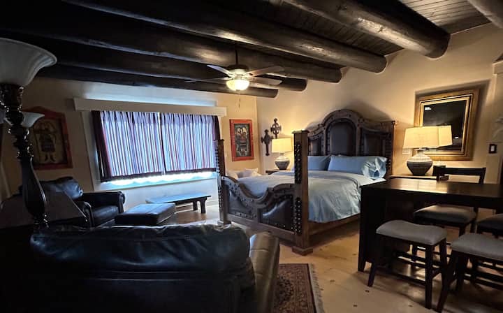 King size Suite with black out window coverings, dinette , 85'TV and private covered porch.