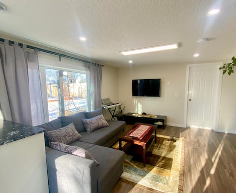 Top performing Airbnb: Cozy Comfort—10 min to Airport — Loved by families in Panorama Hills