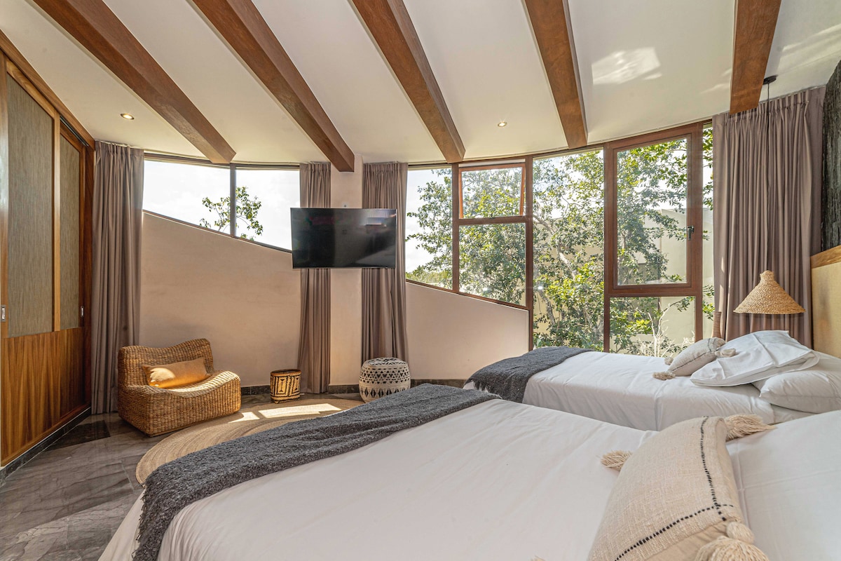 Recamara 3 ，有2張雙人床，配有密碼鎖匙盒