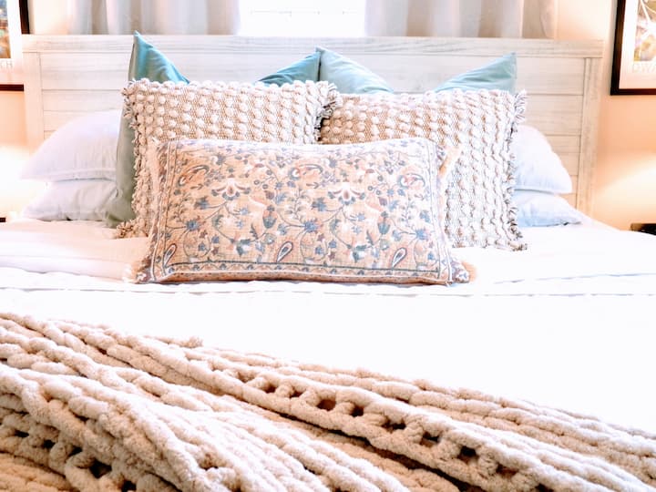 This king bed + blackout curtains combo should come with a warning… you may oversleep, happily.