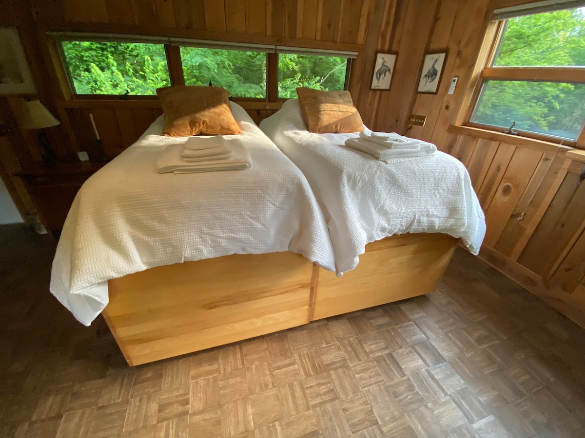Bedroom with two captain's beds