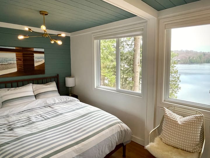 The master bedroom surrounds you with nature.