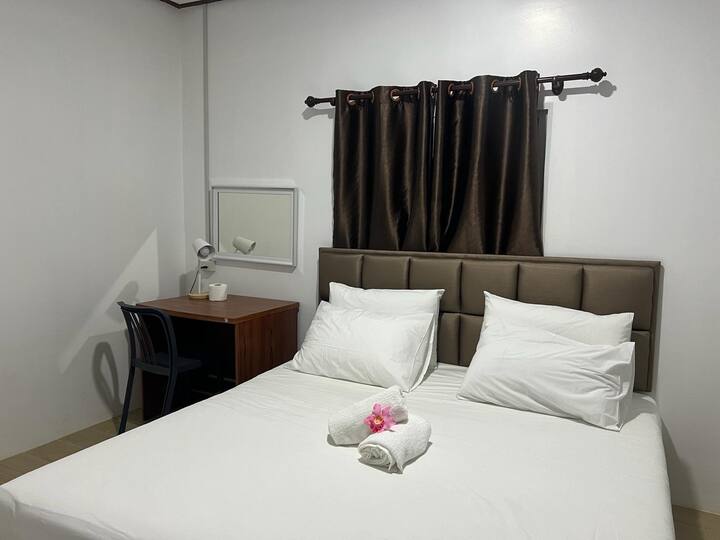 Sleep like a royal family member on the king-size bed.