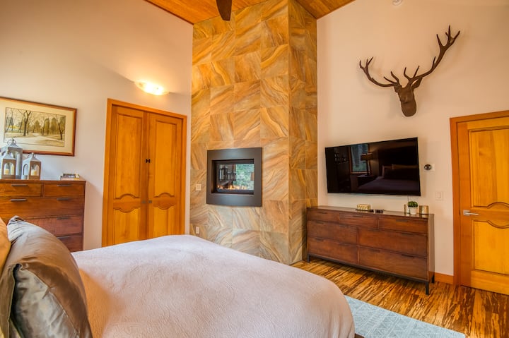 Master bedroom on the first floor with full en-suite bathroom + propane fireplace.