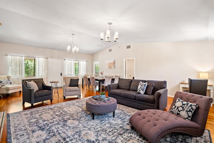 Spacious living and dining area at The Source Home, 1000 Kiler Canyon Road for full relaxation.