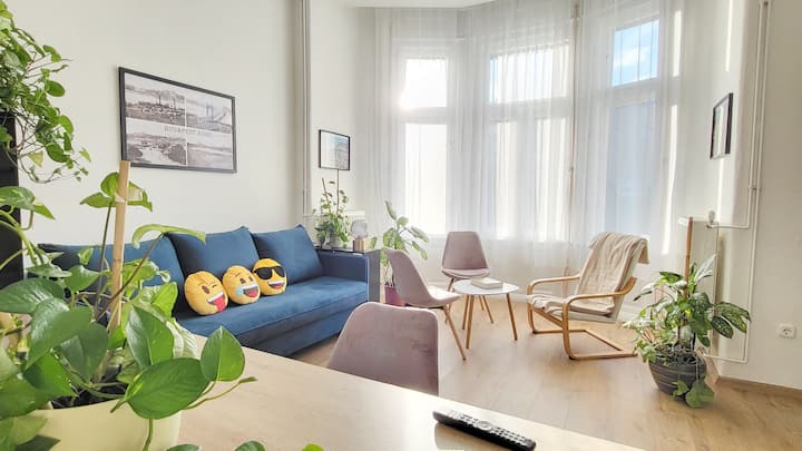 Salon avec canapé-lit gigogne et salon