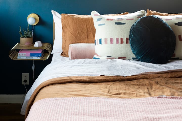 Primary bedroom on the main floor with a king bed