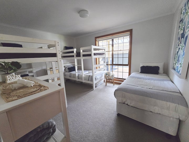 Bedroom 3 - 2 sets of bunks & 1 single ensemble. Top bunks are no longer made up for guests. 