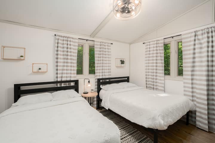 2 full sized beds, TV, dresser and closet.