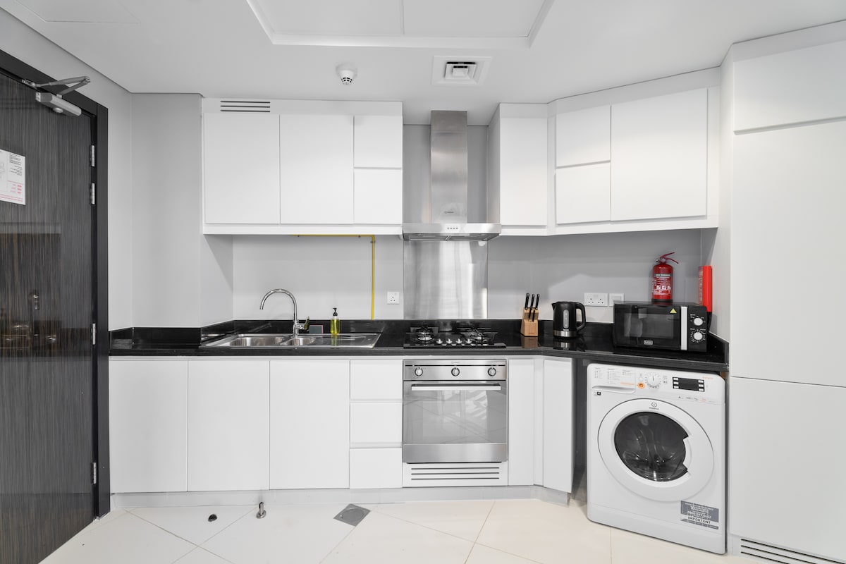 Successful Airbnb property: Charming Studio at DAMAC Hills Artesia Tower C in Al Hebiah Third