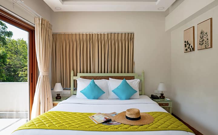 This luxurious, airy bedroom on the first floor seamlessly blends lavish design with minimalist essence. With an ensuite bathroom, this elegant and serene retreat ensures both convenience and relaxation.