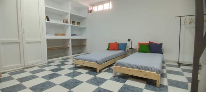 In the semi-basement, two separate beds of 80cm x 190cm. 