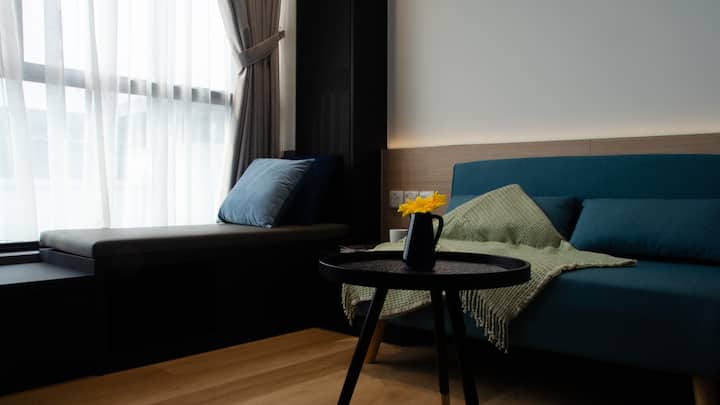 Sala de estar con sofá cama