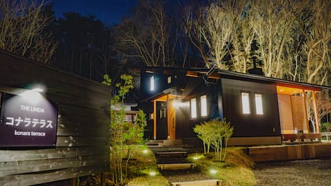 Konara Terrace, a 555 m² villa with a small stream