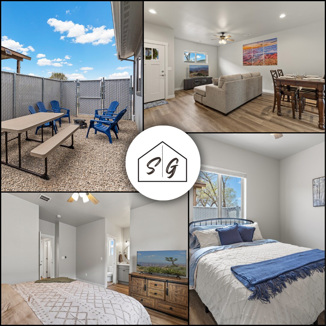 An outdoor area is equipped with blue Adirondack chairs and a picnic table set on gravel. The interior living space shows a cozy sofa, dining table, and a vibrant landscape artwork hung on the wall. A serene bedroom features a neatly made bed and a decorative wall-mounted TV.