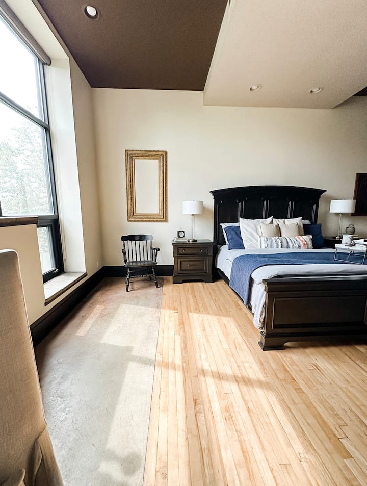 King-sized bed + Restoration Hardware bedding for you to enjoy!