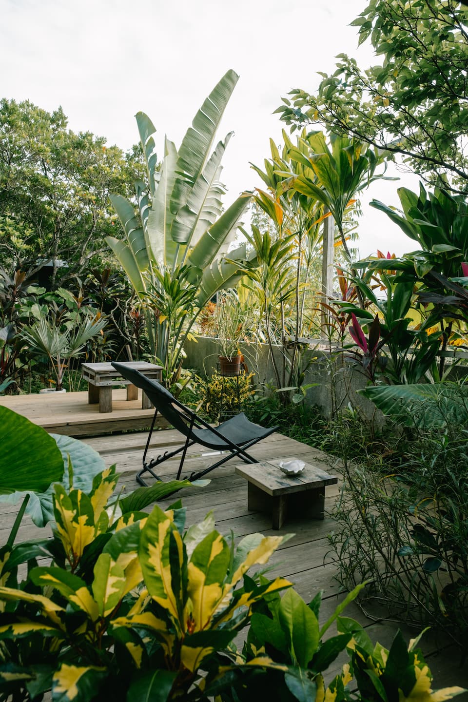 A timber house in a tropical garden in southern Okinawa, Nanjo, Okinawa, Japan, photo 8 of 10