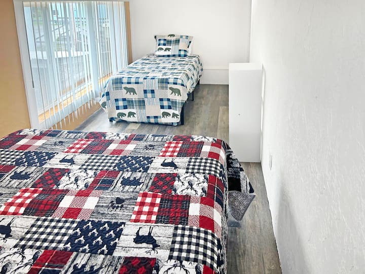 Lots of gear space for privacy in Bedroom 2.  Also, enjoy a beautiful view from the large window of the mountains and Cook Inlet.