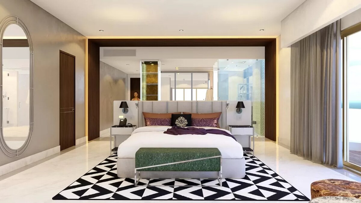 Შეაბიჯეთ ლუქს-კლასის სასტუმროში „მუსაი-კანკუნი“ ამ შთამბეჭდავი, თანამედროვე აპარტამენტით, რომელიც აღჭურვილია ელეგანტური დიზაინით, პლუშის თეთრეულითა და ფართო განლაგებით. Დატკბით ოკეანის განსაცვიფრებელი ხედებით, უმაღლესი დონის საყოფაცხოვრებო პირობებითა და 5-დიამან მომსახურებით დაუვიწყარი სტუმრობისთვის.