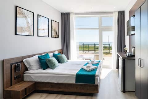 Pаrаdisе Viеw - Room with sofa and seaview