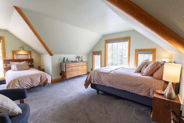 A peaceful night's sleep under wood beams and mountain silence.