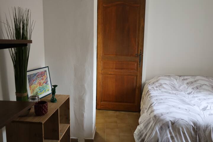 A master bedroom with a 140 bed upstairs