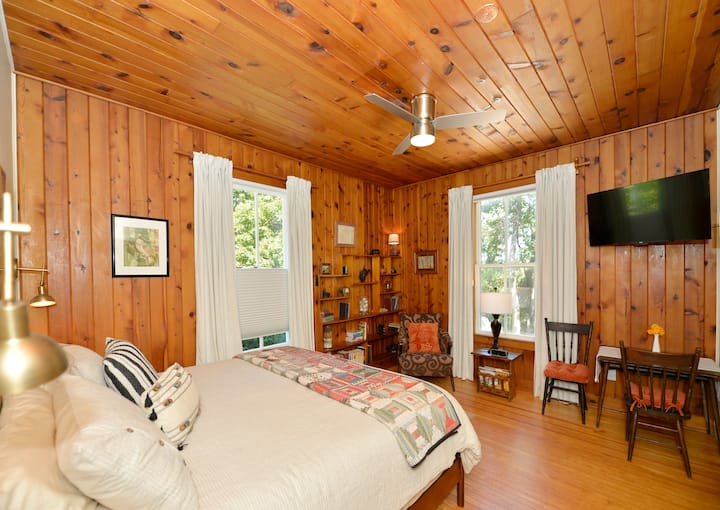The primary king bedroom is called the West Virginia suite and has a walk-in closet and amazing zen-inspired en suite bathroom. 