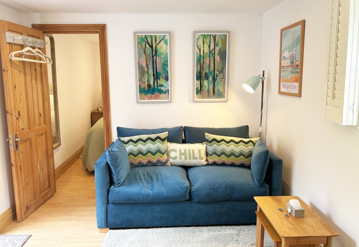 Popular Airbnb listing: Cosy Cottage w Log Burner S Downs Way nr Brighton in Mid Sussex