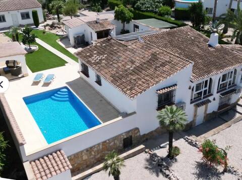 Single-story villa with large garden and private pool