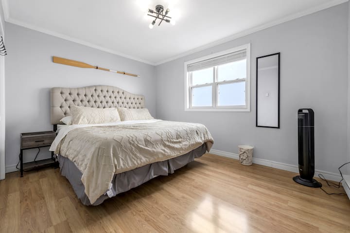 Master King bed with ocean view & large closet space. Comes with two side tables with USB ports to charge your electronics and an oscillating fan