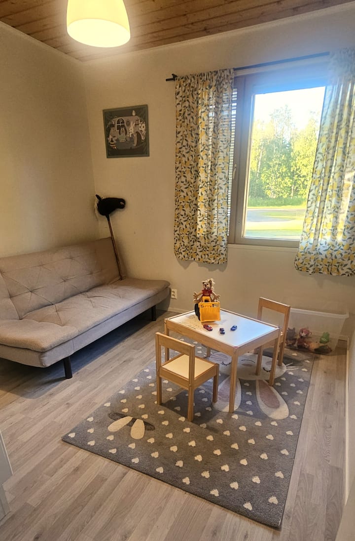 A dedicated playroom for kids with toys and books. Mainly meant for kids play area, but there is a 115cm sofa bed.