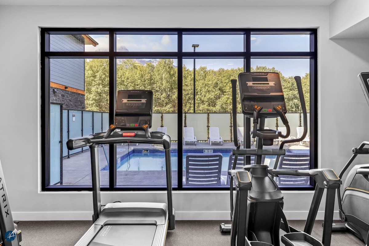 The Owl's Nest Canmore-area condo — Exercise room cardio equipment