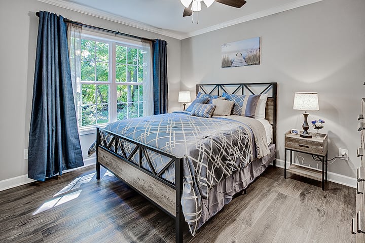 Second bedroom with new queen bed, comfy mattress, and Roku TV.