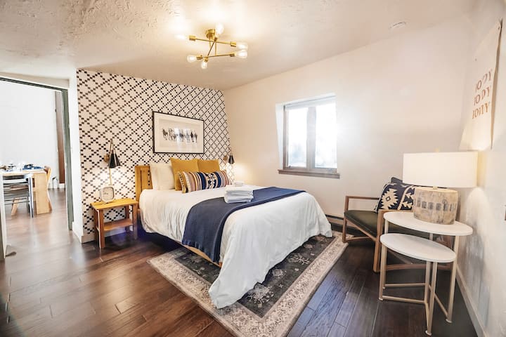 Impeccably designed first floor bedroom includes a Queen sized bed with memory foam mattress, cozy ready corner and large closet