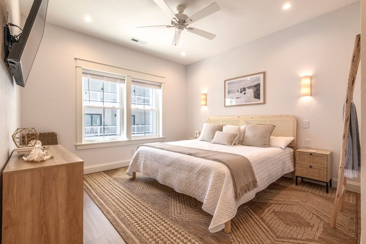 Sink into serenity in our boho-themed living space, designed to bring effortless style and comfort to your beachfront vacation.