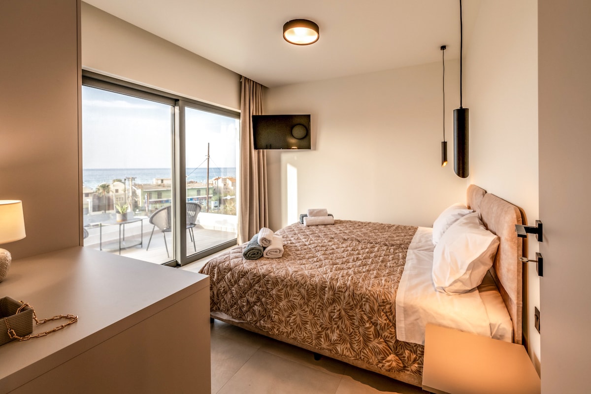 First Floor: Bedroom with private balcony