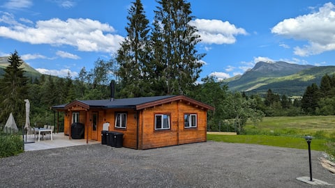 Cozy cabin by the waterfall, with a built-in jacuzzi.