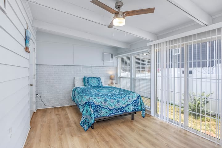 LOTS of natural light . In wall AC/heater, ceiling fan