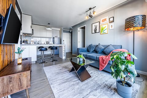 2BR Apt · WiFi · 24/7 Check-in · 10 min Airport