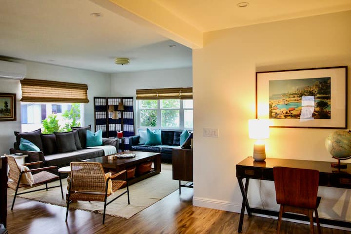 This modern beach home is the perfect place to relax, unwind and take it easy. The living room has an ocean view and an open floor plan with lots of natural light.