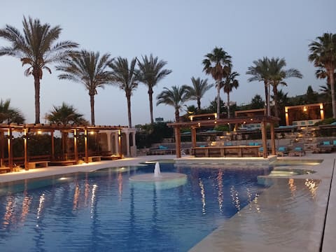 Luxury guest house room with pool and beach