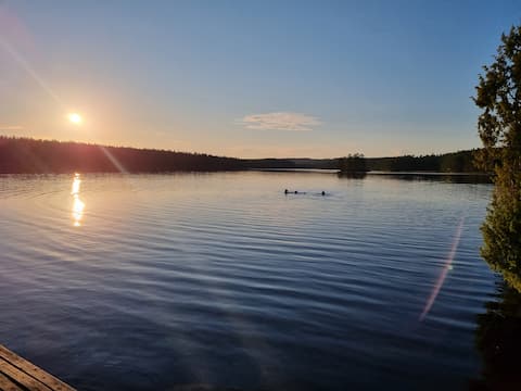 Beach plot with villa, boat, sauna & private jetty