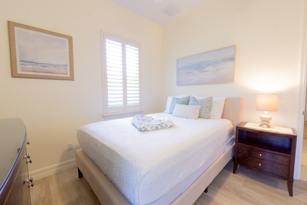 Comfortable queen size bed with TV 