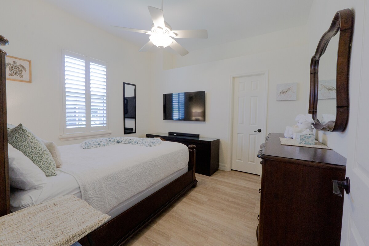 Comfortable queen size bed with TV 